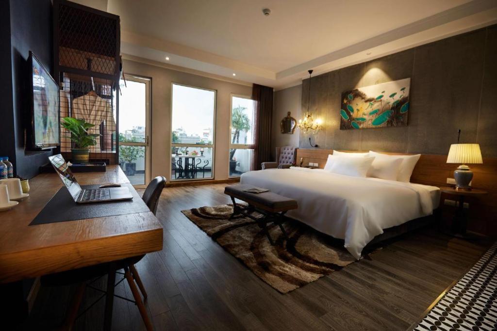 Review khách sạn Ha Noi Calido Hotel – GetGo Vietnam 5 Quầy lễ tân Ha Noi Calido Hotel thân thiện