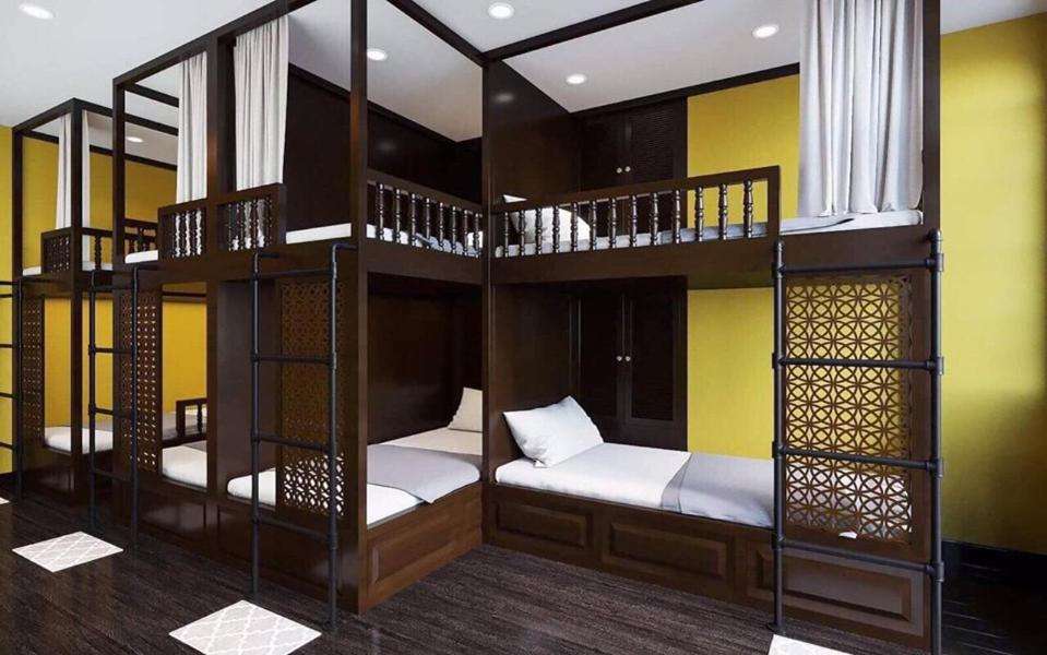 Khu ăn sáng và bếp nhỏ của Tabalo Hostel Hanoi dành cho khách nghỉ