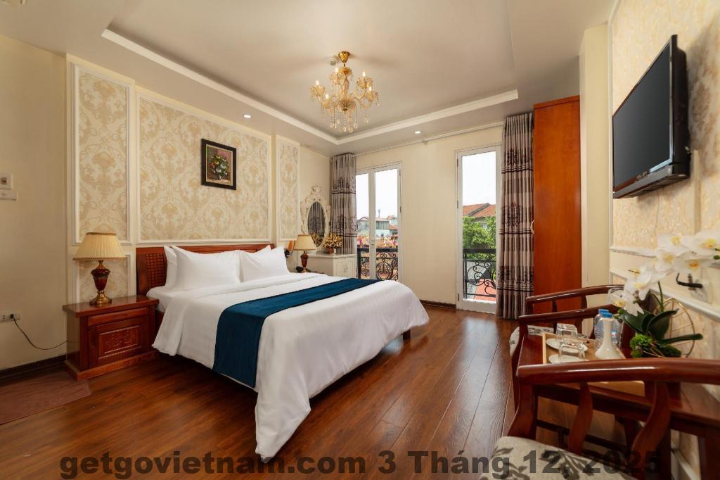 Phòng ngủ Delica Premium Hotel Hà Nội sang xịn và ấm cúng