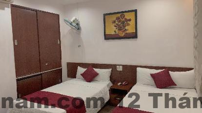 Phòng ngủ tiêu chuẩn tại Hotel Hà Thành với nội thất cơ bản