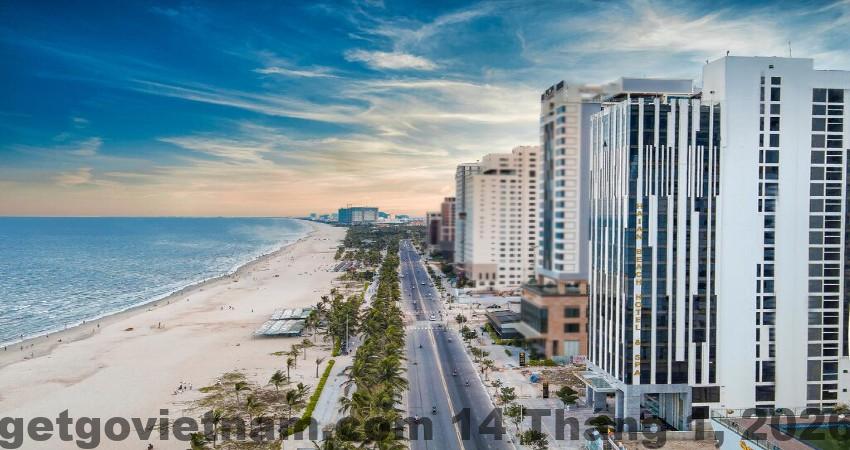 Phòng nghỉ Haian Beach Hotel & Spa thiết kế hiện đại, giường lớn, cửa kính đón ánh sáng tự nhiên