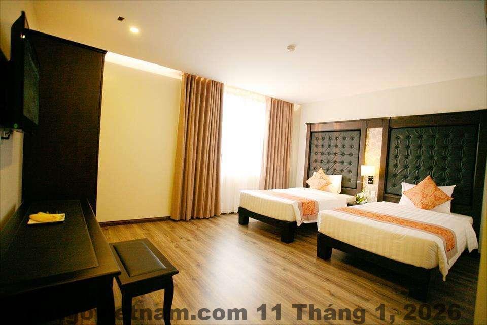 Phòng nghỉ Khách sạn Hoàng Phú Gia với nội thất đơn giản, sạch sẽ và đầy đủ tiện nghi cơ bản