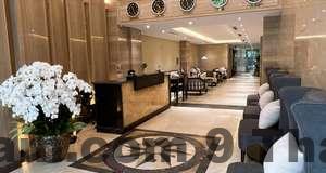 Phòng ngủ Minasi HanoiOI LakeSide Hotel với nội thất hiện đại, tông màu sáng, phù hợp khách ở ngắn ngày