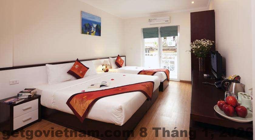 Phòng ngủ Spoon Hotel Hà Nội diện tích nhỏ, nội thất đơn giản, phù hợp khách du lịch tự túc