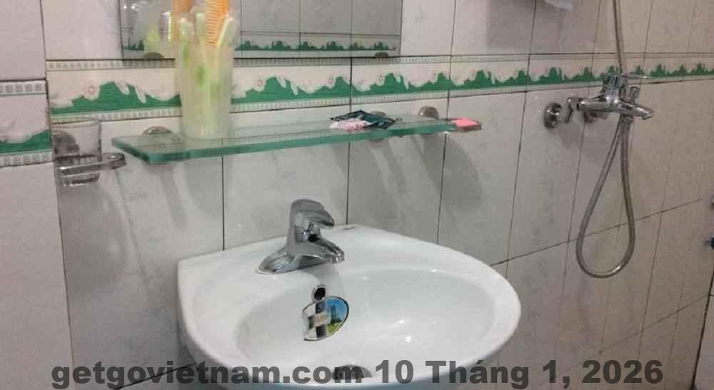 Không gian phòng ngủ Phương Nam Hotel với nội thất cơ bản