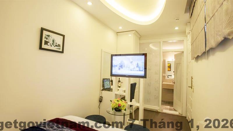 Phòng ngủ Mai Charming Hotel and Spa với nội thất gỗ, phong cách cổ điển, diện tích vừa