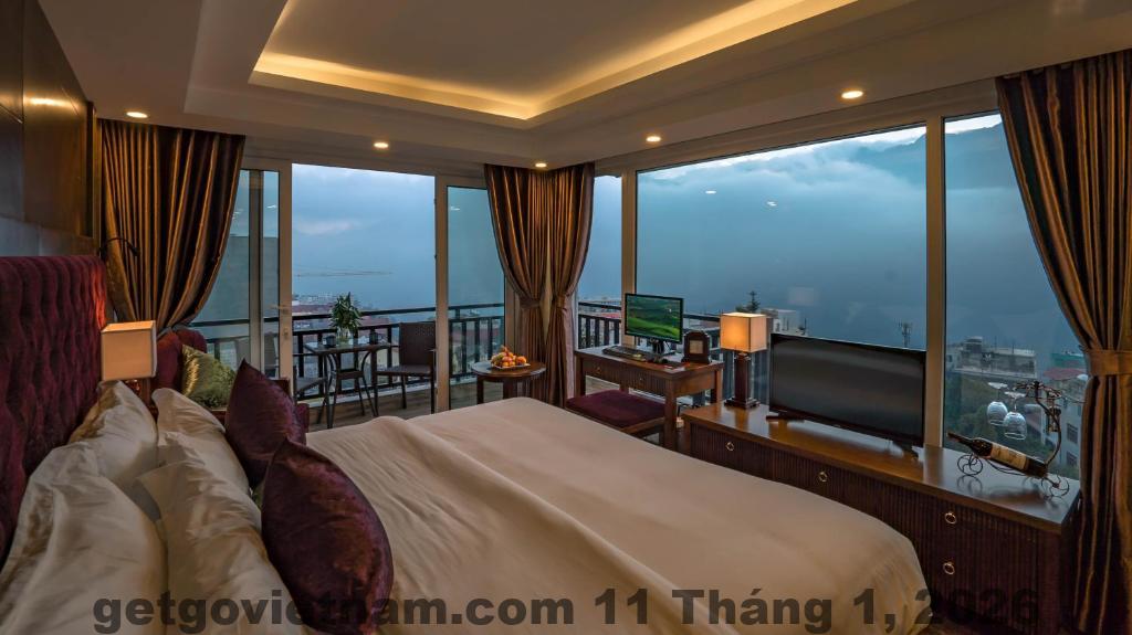Phòng ngủ tại Sapa Florence Hotel với nội thất hiện đại và không gian sang trọng.