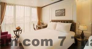 Phòng nghỉ tại Impressive Boutique Hotel với nội thất đơn giản, sạch sẽ