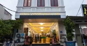 Phòng ngủ tại AVS NOIBAI HOTEL có diện tích rộng, nội thất đơn giản