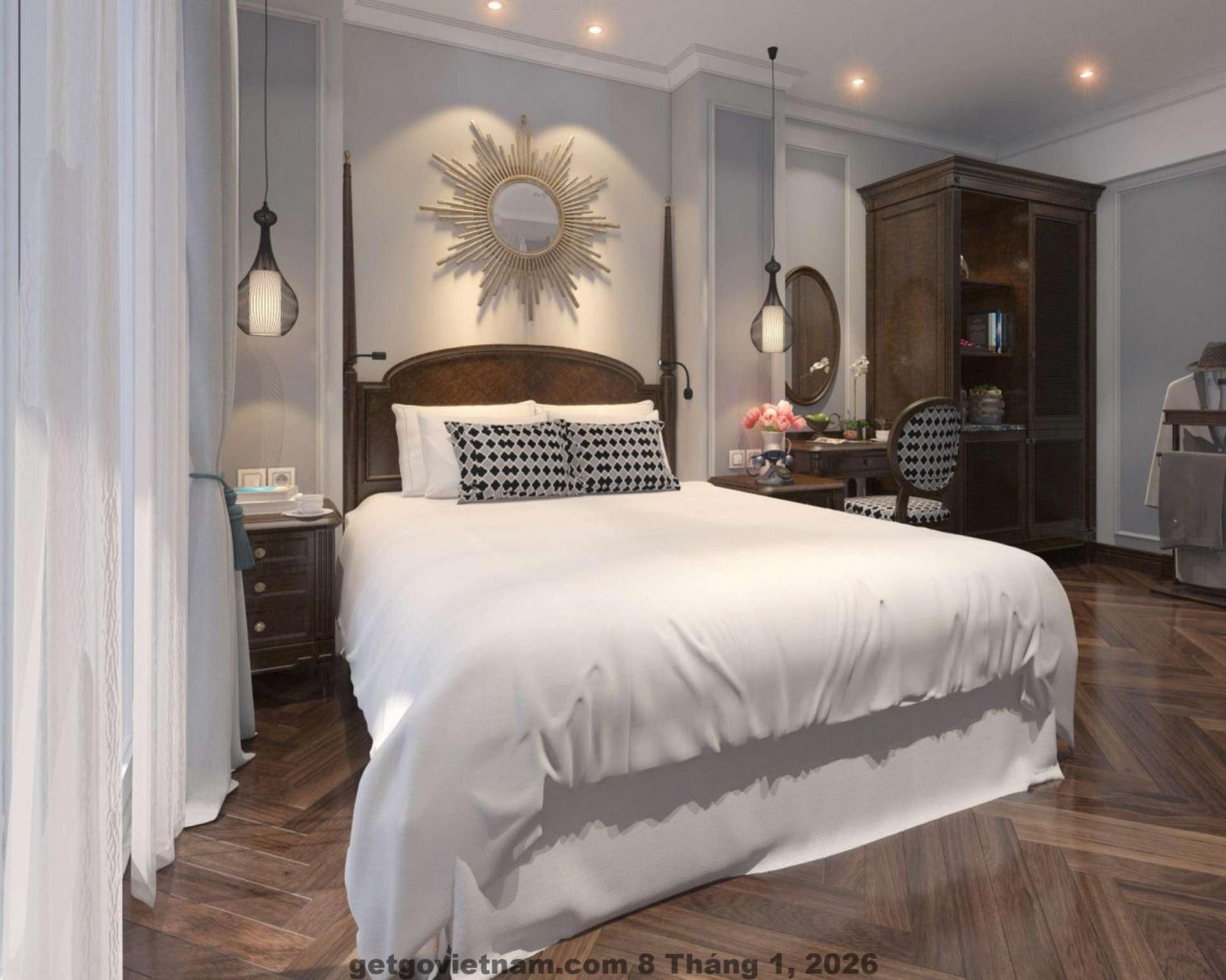 Phòng ngủ Grande Collection Hotel & Spa thiết kế hiện đại, giường lớn và ánh sáng ấm