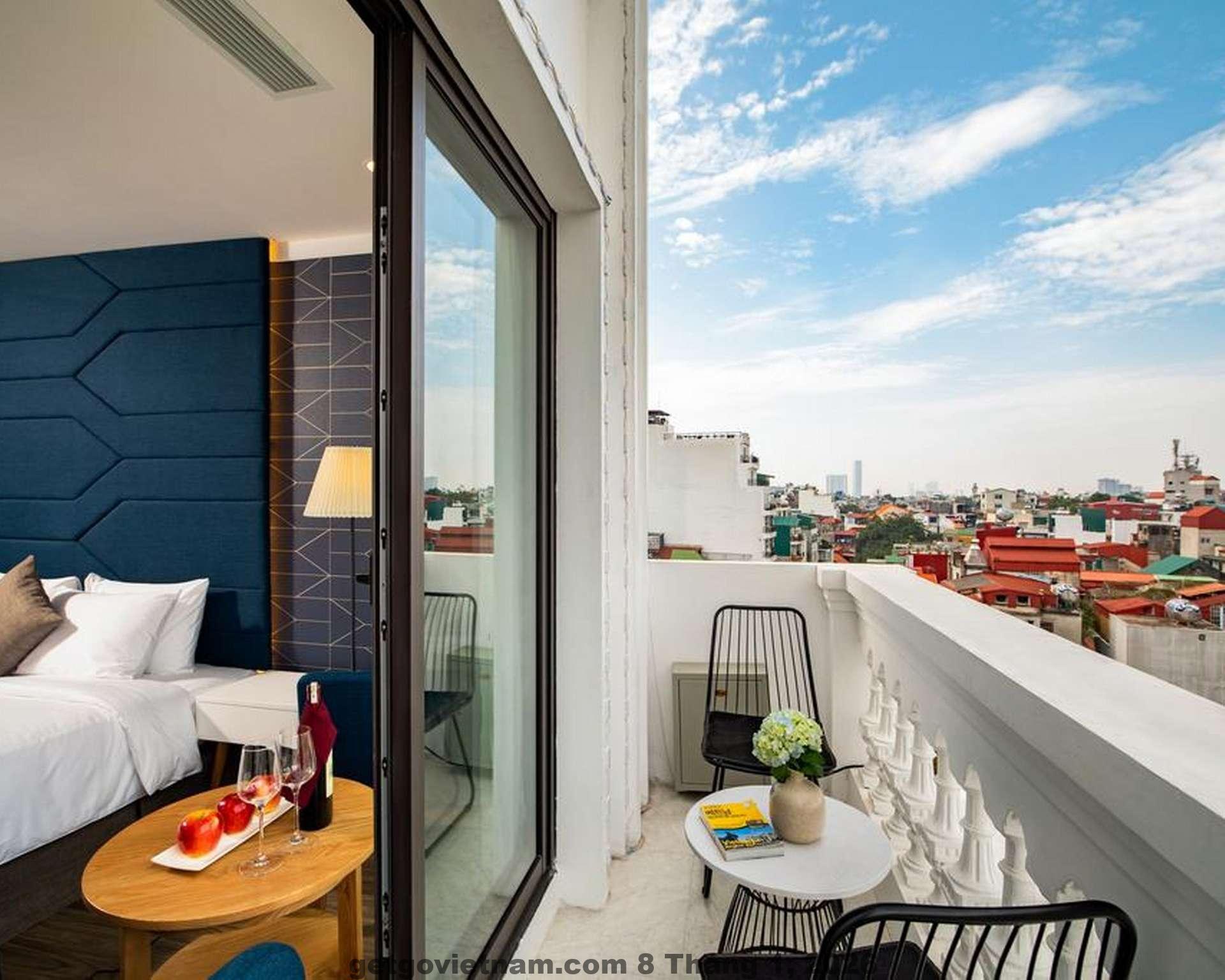 Phòng ngủ tại La Passion Premium Cầu Gỗ Hotel với thiết kế nhỏ gọn nhưng hiện đại