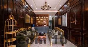 Phòng nghỉ tại Khách sạn Huy Hoàng với không gian thoải mái nhưng vẫn thiếu sự mới mẻ trong thiết kế nội thất.