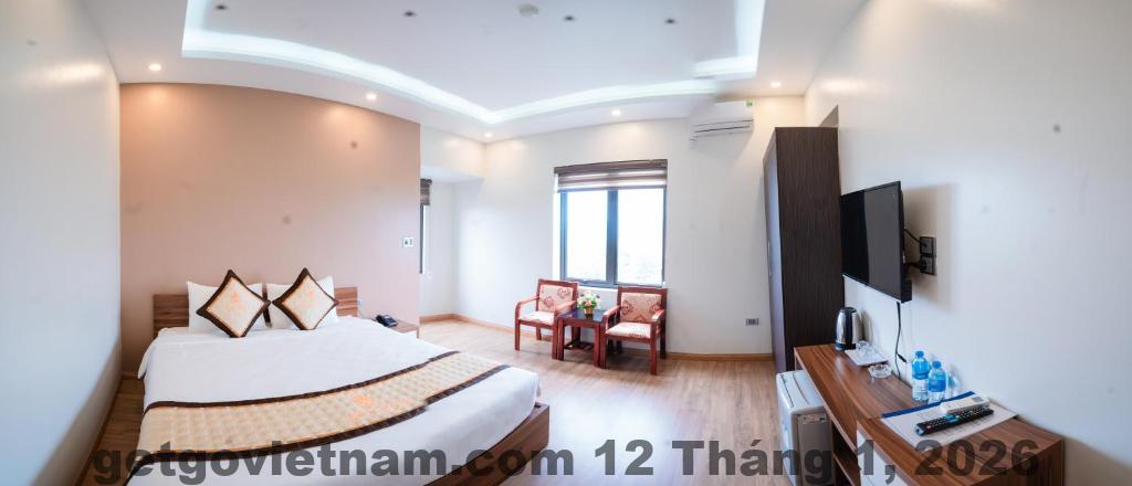 Phòng ngủ Sky Hotel Uông Bí với giường đôi, nội thất cơ bản và ánh sáng tự nhiên