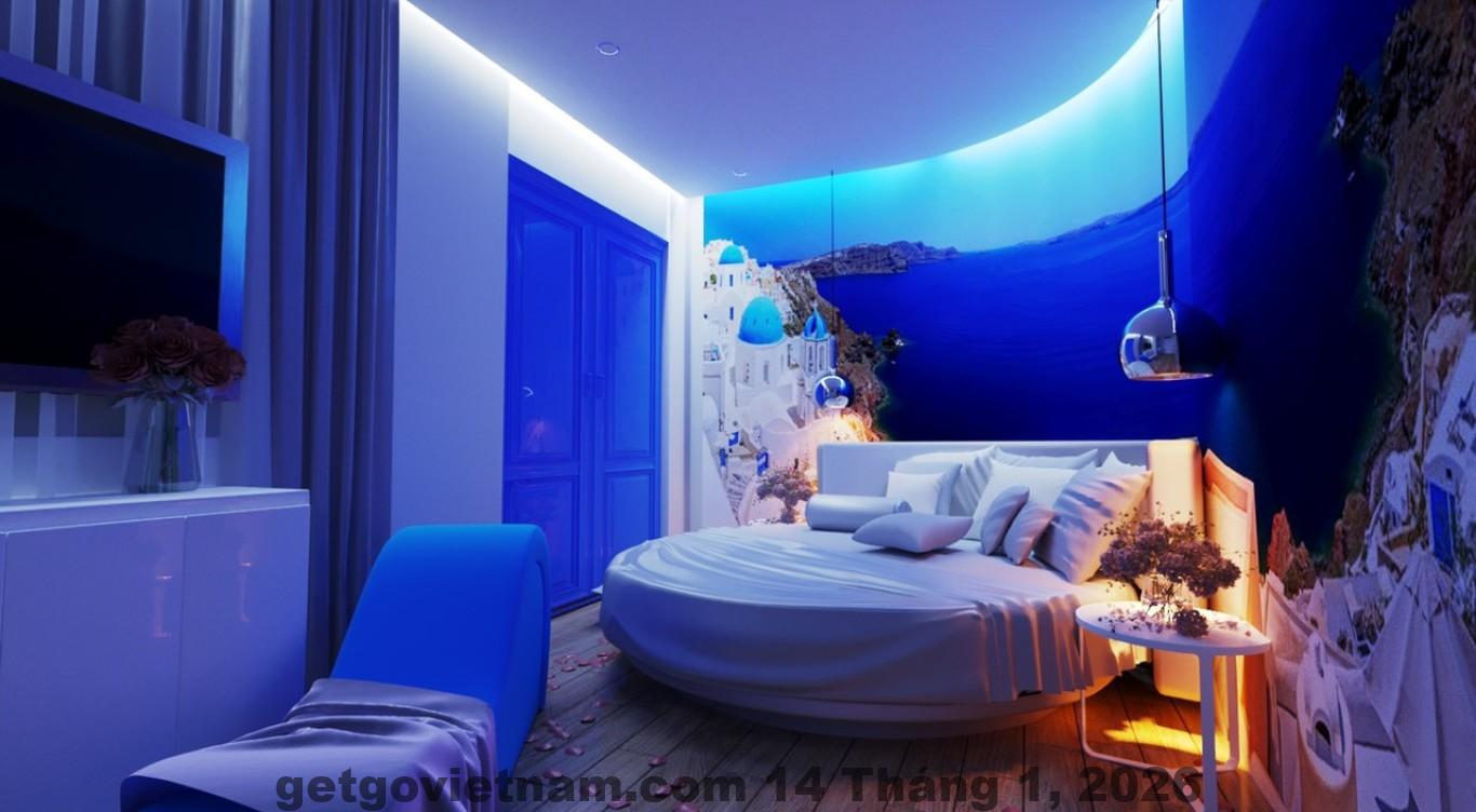 Phòng nghỉ tại Khách sạn Quỳnh Hương với nội thất cơ bản, giường đôi, tông màu đơn giản