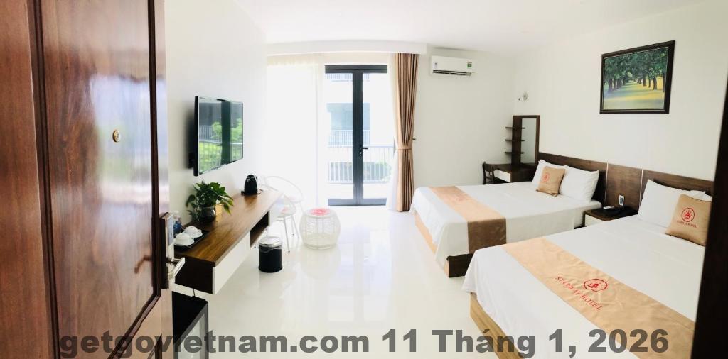 Phòng ngủ Starway Hotel thiết kế đơn giản, ánh sáng tốt