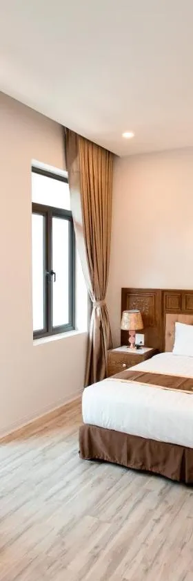 Phòng ngủ Sài Thành Hotel với nội thất cơ bản và diện tích vừa phải