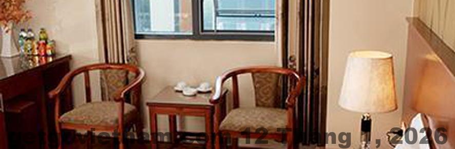 Phòng ngủ tiện nghi với giường ngủ lớn và không gian sáng sủa