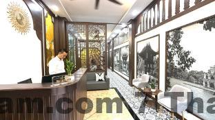 Phòng ngủ tiêu chuẩn tại Hanoi Gem Hotel với thiết kế boutique đơn giản