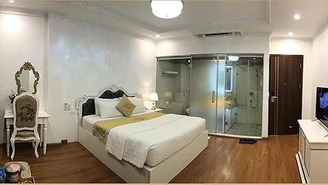 Phòng ngủ tiêu chuẩn tại Khách sạn Lâm Anh với nội thất cơ bản