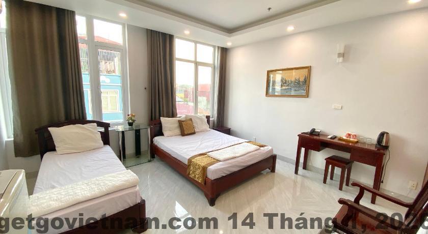 Phòng nghỉ Khách sạn Bạch Dương Ba Vì với nội thất cơ bản, thiên về công năng