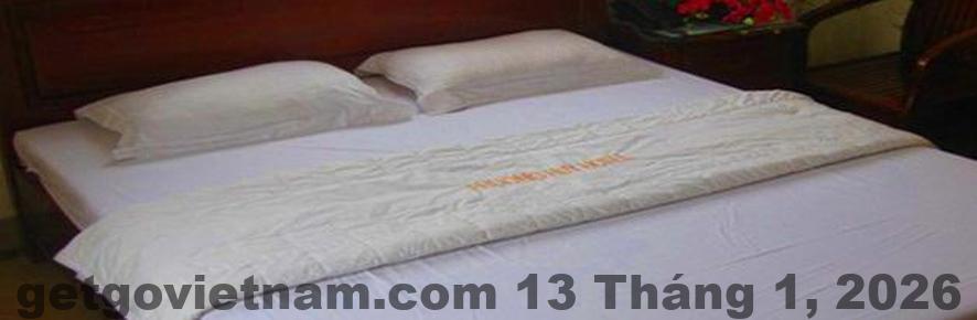 Phòng ngủ tại khách sạn Phương Huy 1, không gian đơn giản và gọn gàng