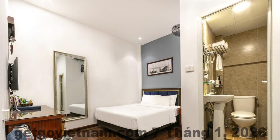 Phòng tiêu chuẩn tại A25 Hotel 12 Liên Trì với nội thất cơ bản