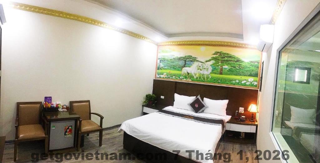 Phòng ngủ Bảo Anh Hotel sạch sẽ, thiết kế đơn giản, ánh sáng tốt