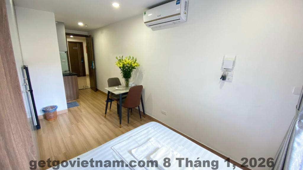 Khu vực bếp nhỏ trong phòng Era Apartment Xt phục vụ nhu cầu tự nấu
