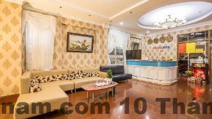 Không gian phòng ngủ Mimosa Hotel với nội thất cơ bản và diện tích vừa phải