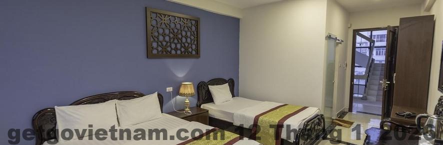 Phòng nghỉ tiêu chuẩn tại Khách Sạn Hữu Nghị 2 với nội thất truyền thống