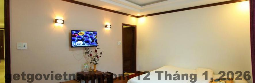 Phòng nghỉ tại Trung Huyền Hotel Sa Pa với nội thất cơ bản, gọn gàng