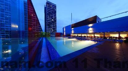 Không gian phòng ngủ Aurora Hotel Hạ Long với giường đôi, nội thất cơ bản, gọn gàng