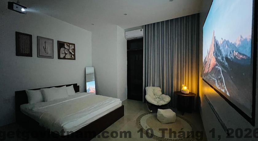 Phòng ngủ Didou Homestay thiết kế đơn giản gọn gàng