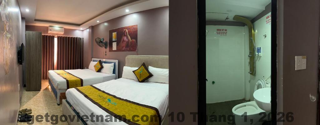 Phòng nghỉ tại SPOT ON 1150 New Sun Hotel với nội thất đơn giản nhưng đầy đủ tiện nghi cơ bản cho khách lưu trú.