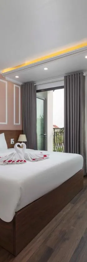 Phòng ngủ Anova 1 Hotel với nội thất đơn giản, diện tích vừa phải