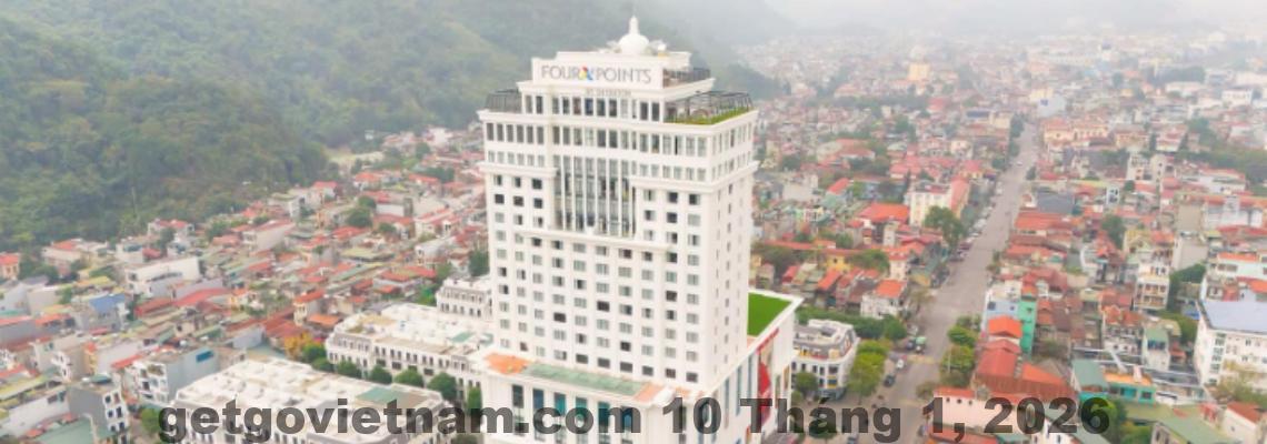 Phòng ngủ Four Points by Sheraton Ha Giang với giường lớn, nội thất hiện đại và cửa sổ rộng