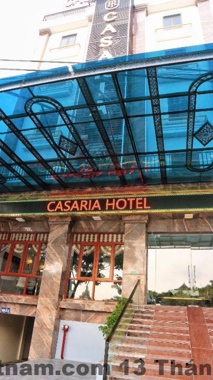 Phòng ngủ tại CASARIA Hotel với nội thất sang trọng và sạch sẽ.