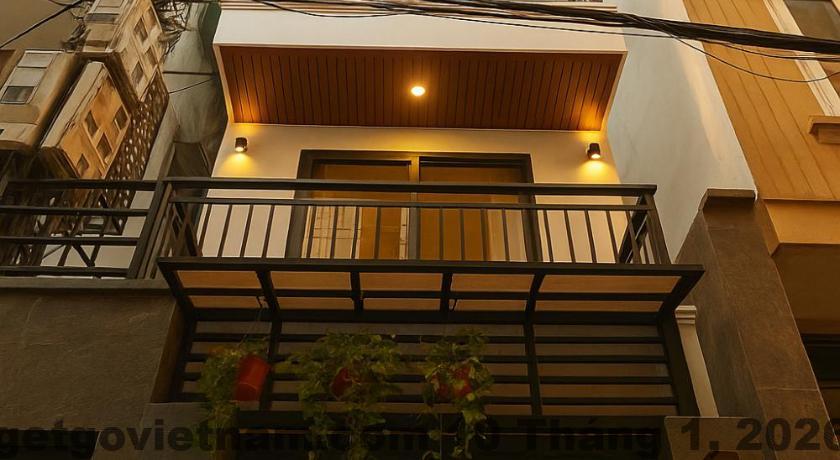 Phòng ngủ tại Ben's Apartment & Hotel Hanoi Center với nội thất đơn giản