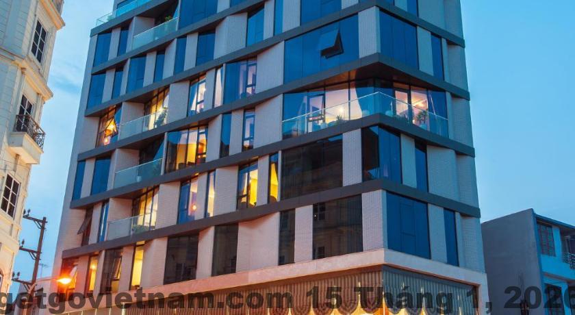 Phòng nghỉ tại BANI HOTEL với giường đôi và nội thất cơ bản