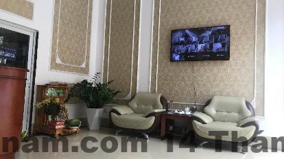 Phòng ngủ Hana Hotel với nội thất đơn giản, tông màu trung tính