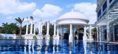 Phòng ngủ tiêu chuẩn tại Grand View Palace Ha Long Hotel với diện tích rộng và nội thất gỗ