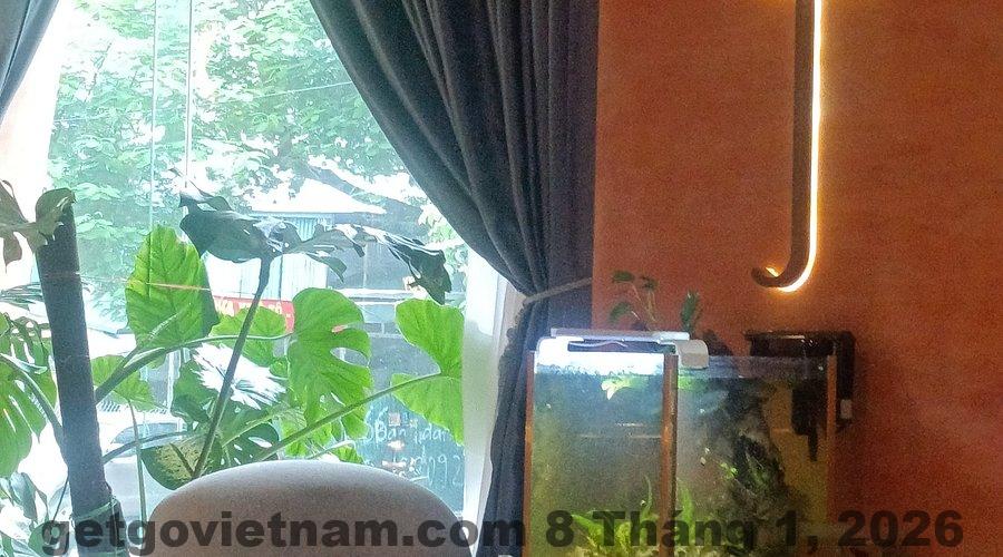 Phòng ngủ tại Jacayl Hotel với giường lớn và ánh sáng ấm