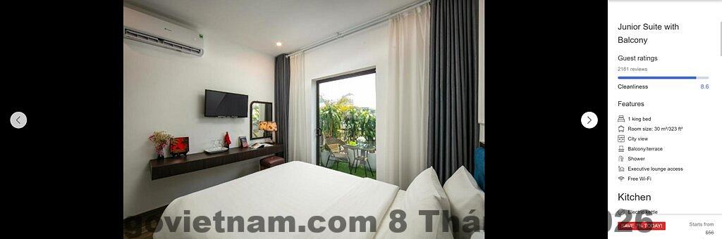 Phòng ngủ tại Dream Cental Hotel & Spa với diện tích vừa phải, nội thất gỗ và ánh sáng tự nhiên hạn chế