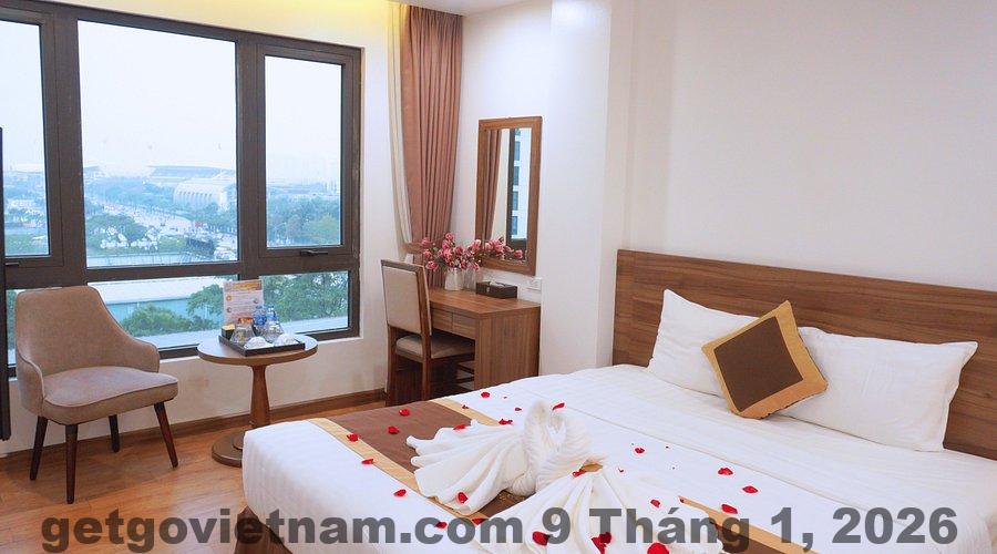 Phòng Deluxe Double tại A89 Rosarian với nội thất hiện đại, tông màu trung tính