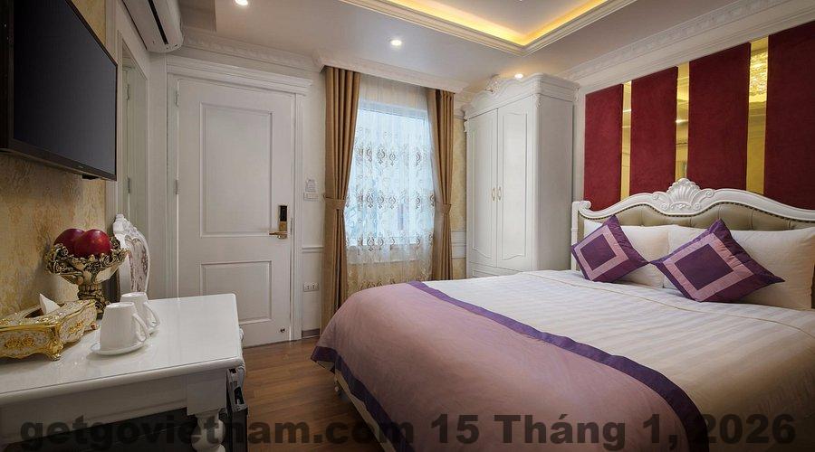 Phòng nghỉ tại Khách sạn Như Nguyệt với giường đôi, nội thất cơ bản, thiết kế đơn giản