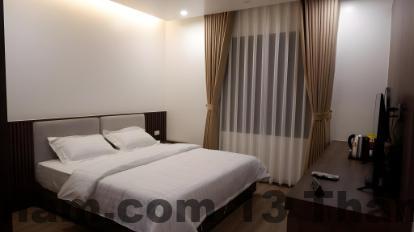 Ảnh: Phòng nghỉ tại Riverside Hotel – Không gian thoáng đãng, đầy đủ tiện nghi.