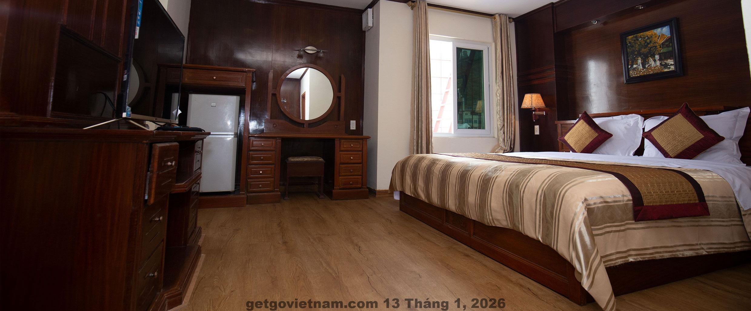 Phòng tại Kiên Ngọc Hotel, không gian thoáng đãng, sạch sẽ