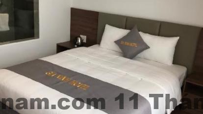 Phòng ngủ Gia Ninh Hotel Hạ Long thiết kế đơn giản, tông màu sáng