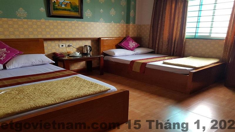 Phòng ngủ Khách sạn Hương Sơn Bắc Giang thiết kế đơn giản, gọn gàng