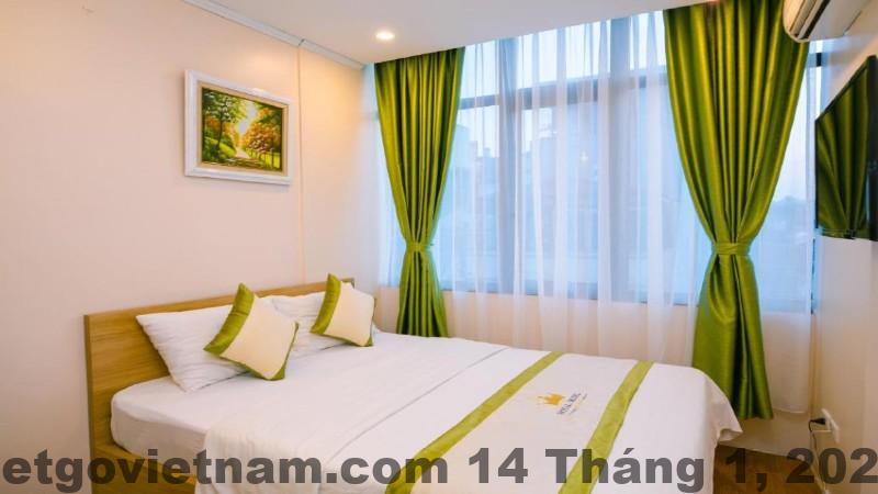 Phòng ngủ Royal Hotel Hải Phòng – nội thất gỗ, phong cách truyền thống